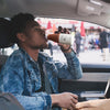Person drinking Soylent Drink Chocolate