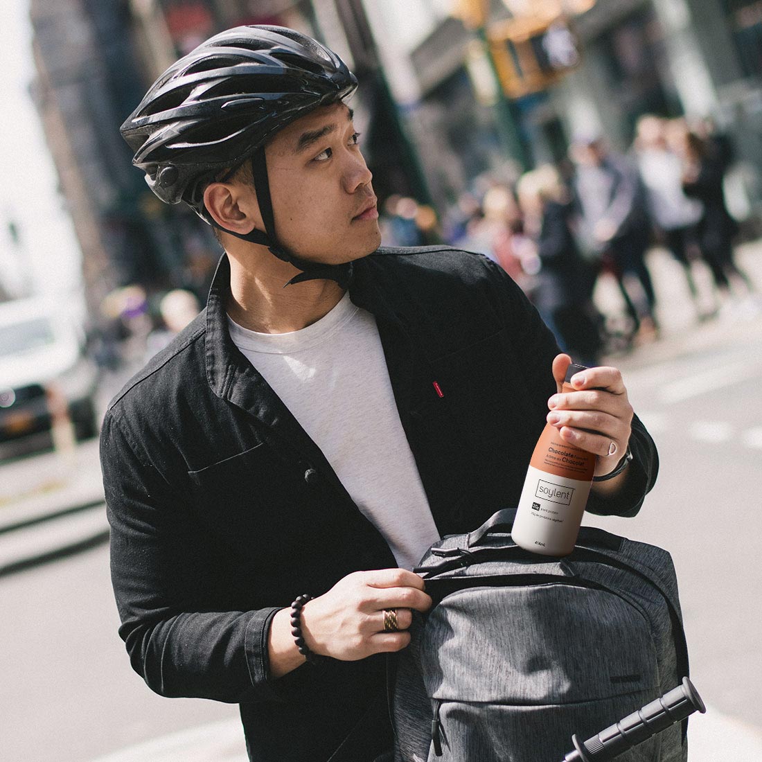 Person holding Soylent Drink Chocolate